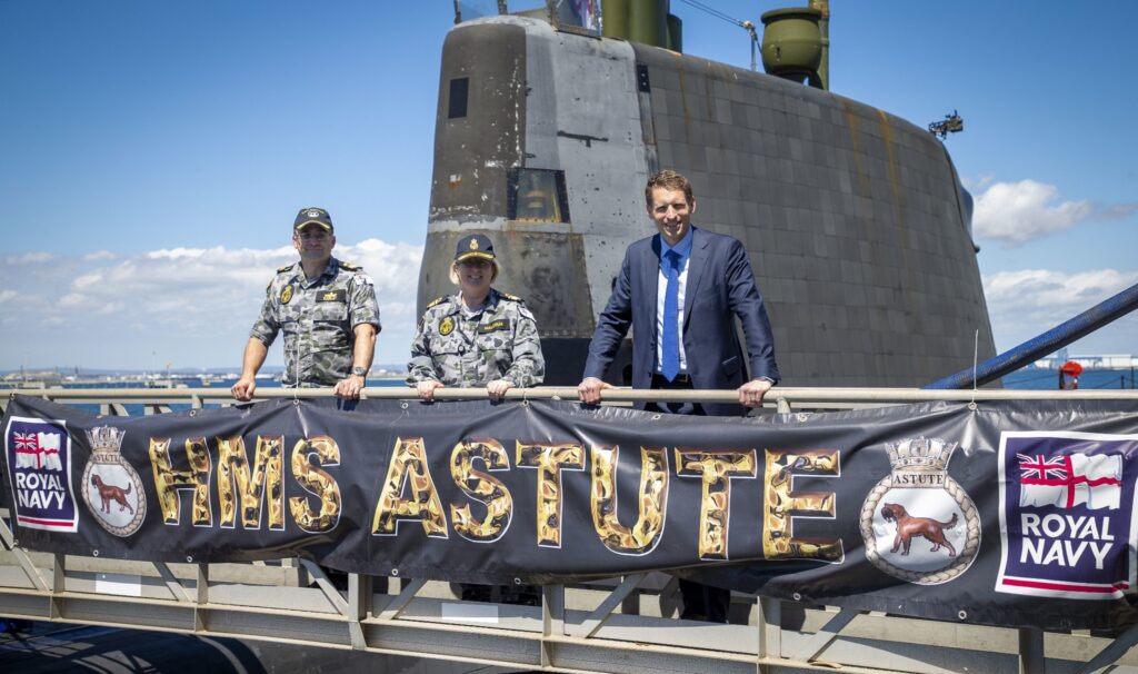 Australian naval commanders and assistant defence minister Andrew Hastie welcome a UK nuclear-powered submarine to Perth. (Photo: RAN / Richard Cordell)