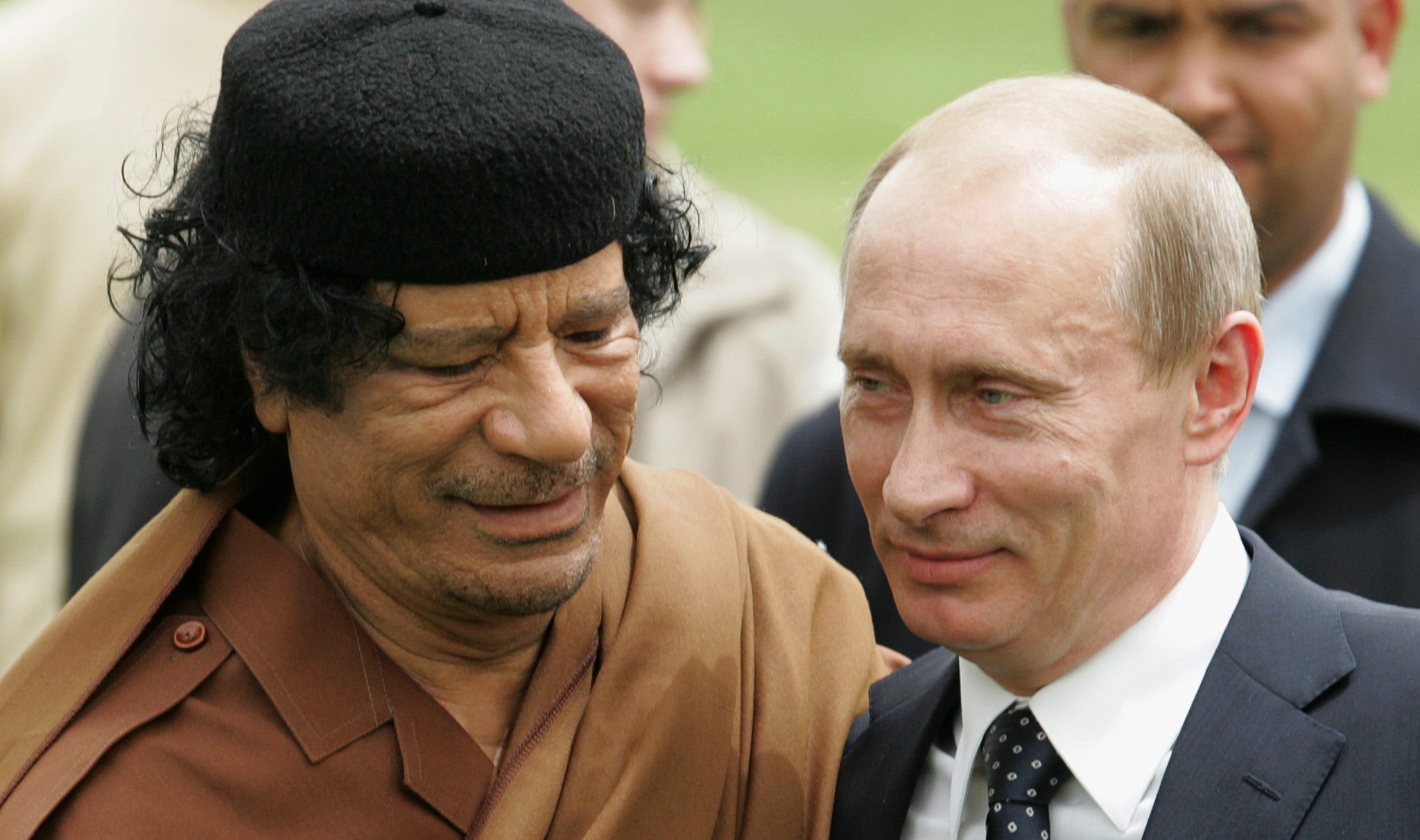 Vladimir Putin visits Muammar Gadaffi in Libya, 2008. (Photo: Artyom Korotayev / Getty)