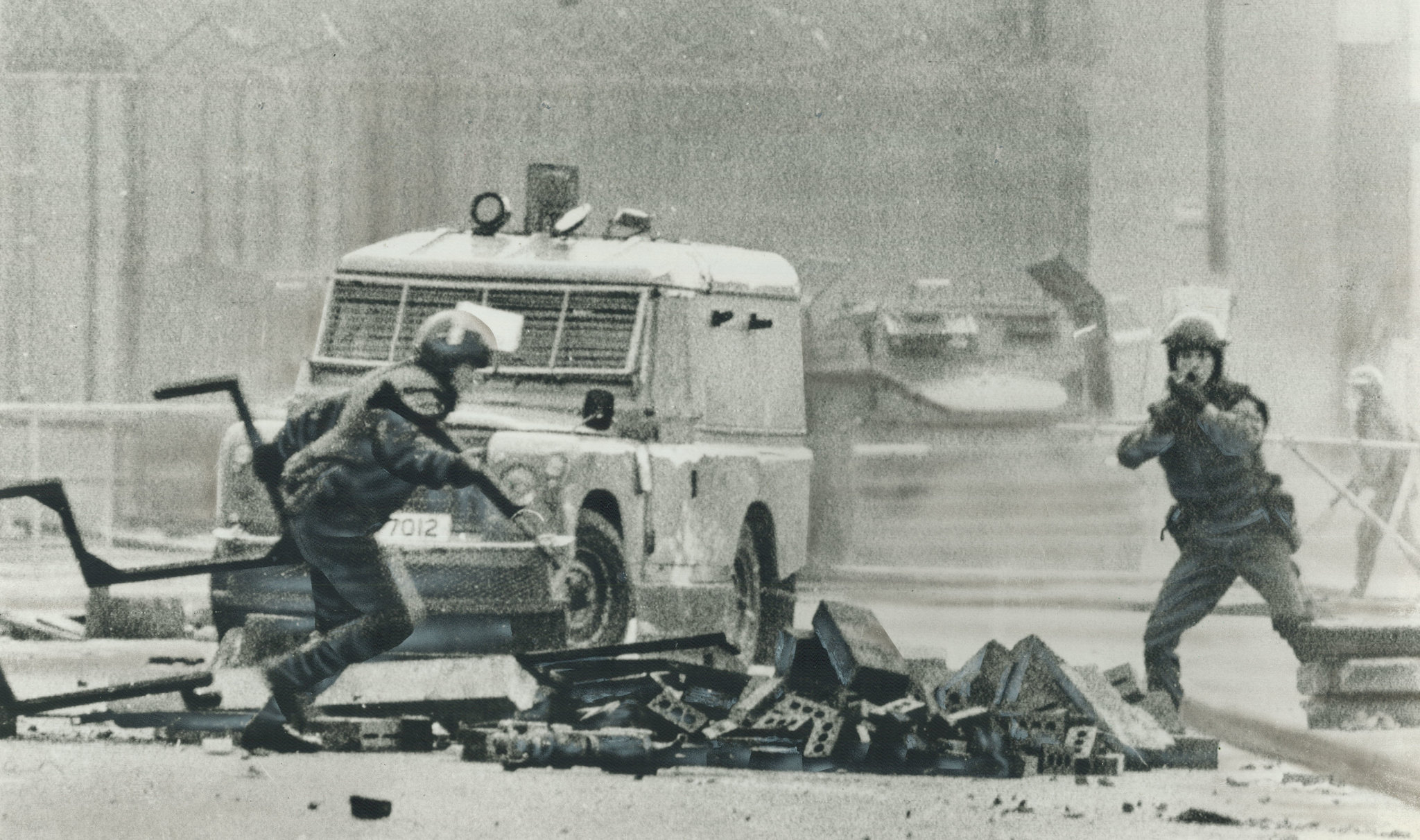 A British soldier fires plastic bullets at rioters in Belfast after the death of IRA hunger striker Bobby Sands. (Photo: Boris Spremo / Toronto Star via Getty)